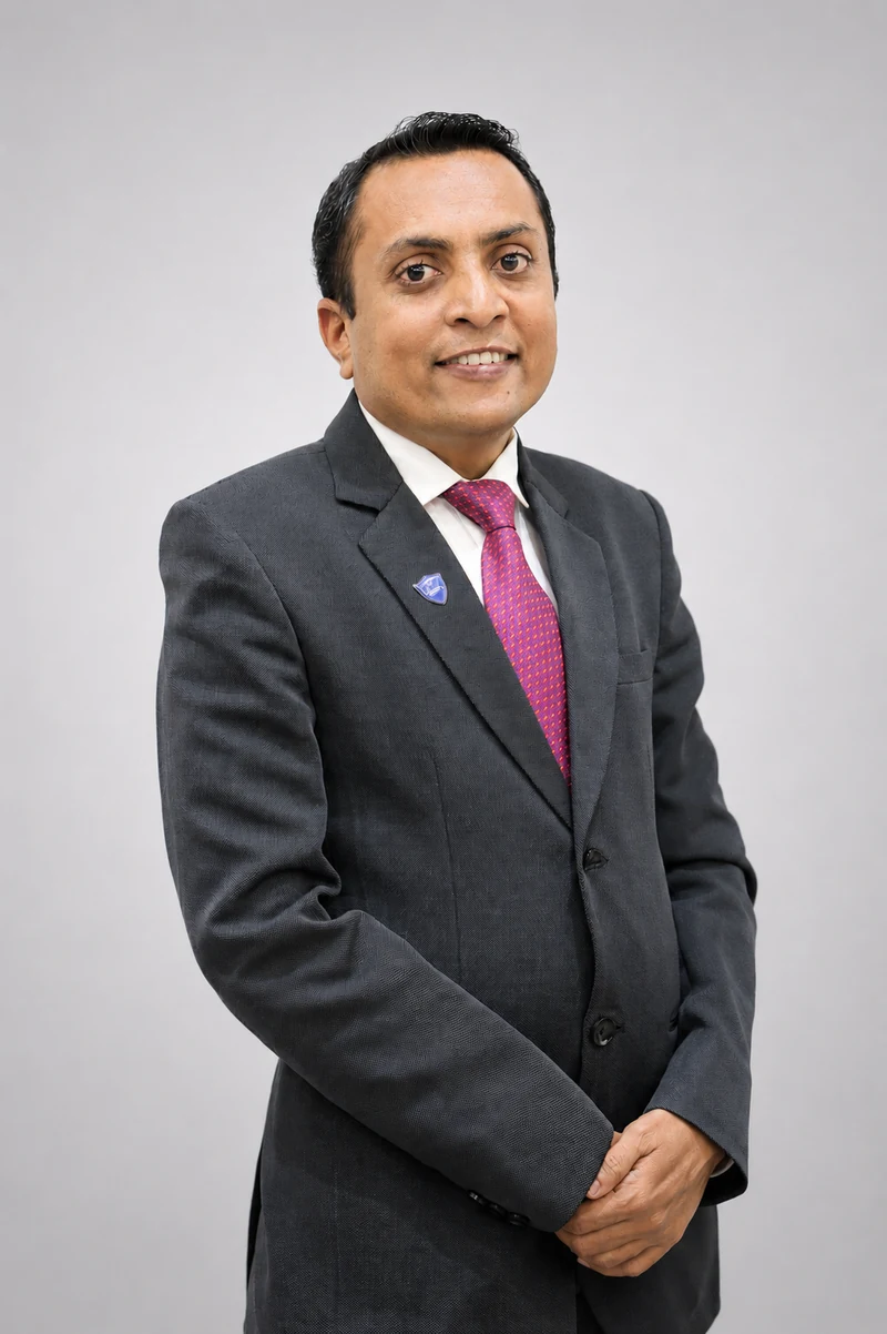 Mehul Madaliya, Founder and Principal Attorney at Madaliya Associates, professional headshot in formal attire